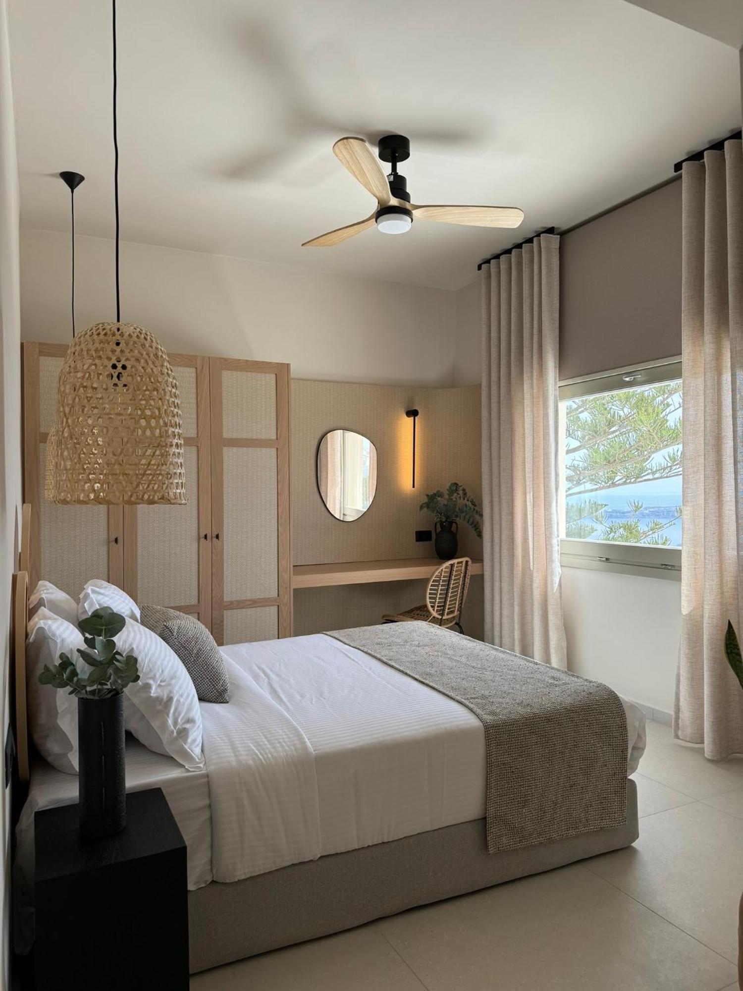 Morfes Luxury Suites By Caldera Houses Фиростефани Екстериор снимка